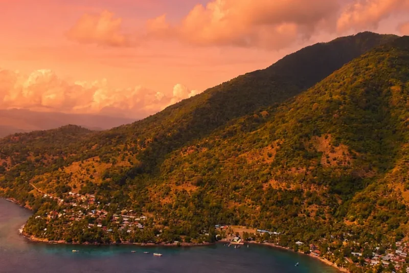 Aerial view of a remote coastline at sunset