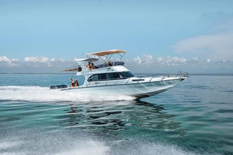 Riki J under way off the Bali coast on a private Nusa Penida day charter